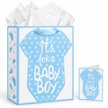 Blue baby shower gift bag with matching card and white tissue paper on white studio background