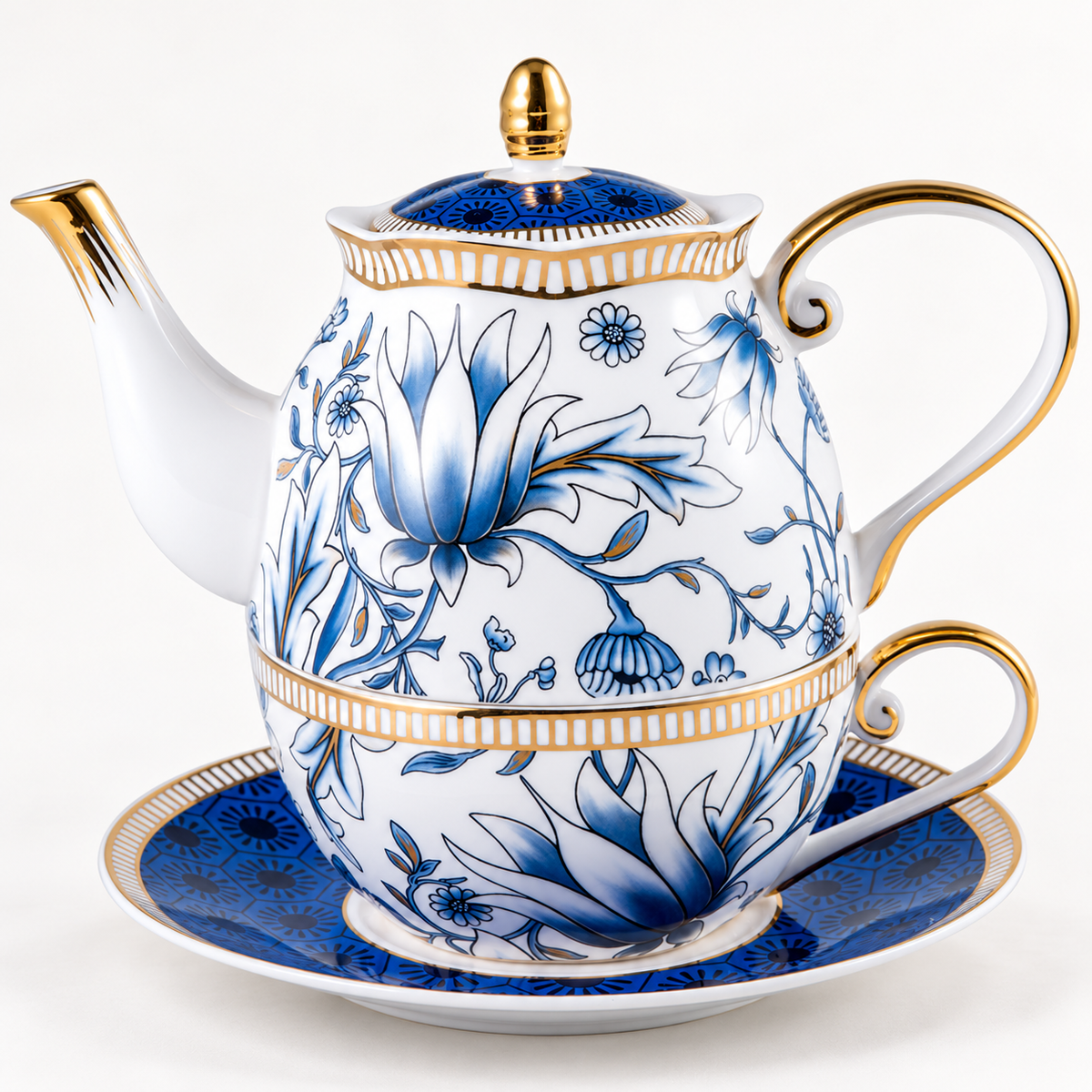 Blue magnolia tea-for-one complete stacked set on a clean studio background