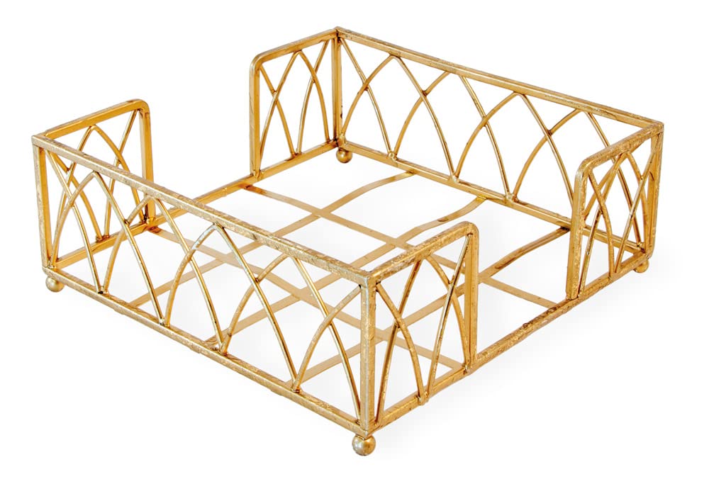 Square gold metal napkin caddy with overlapping arch sides, open corners and small ball feet