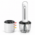 Cordless food chopper with white motor, glass bowl and three stacked white bowls