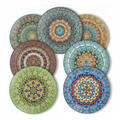 Set of six bohemian mandala ceramic dinner plates fanned on white