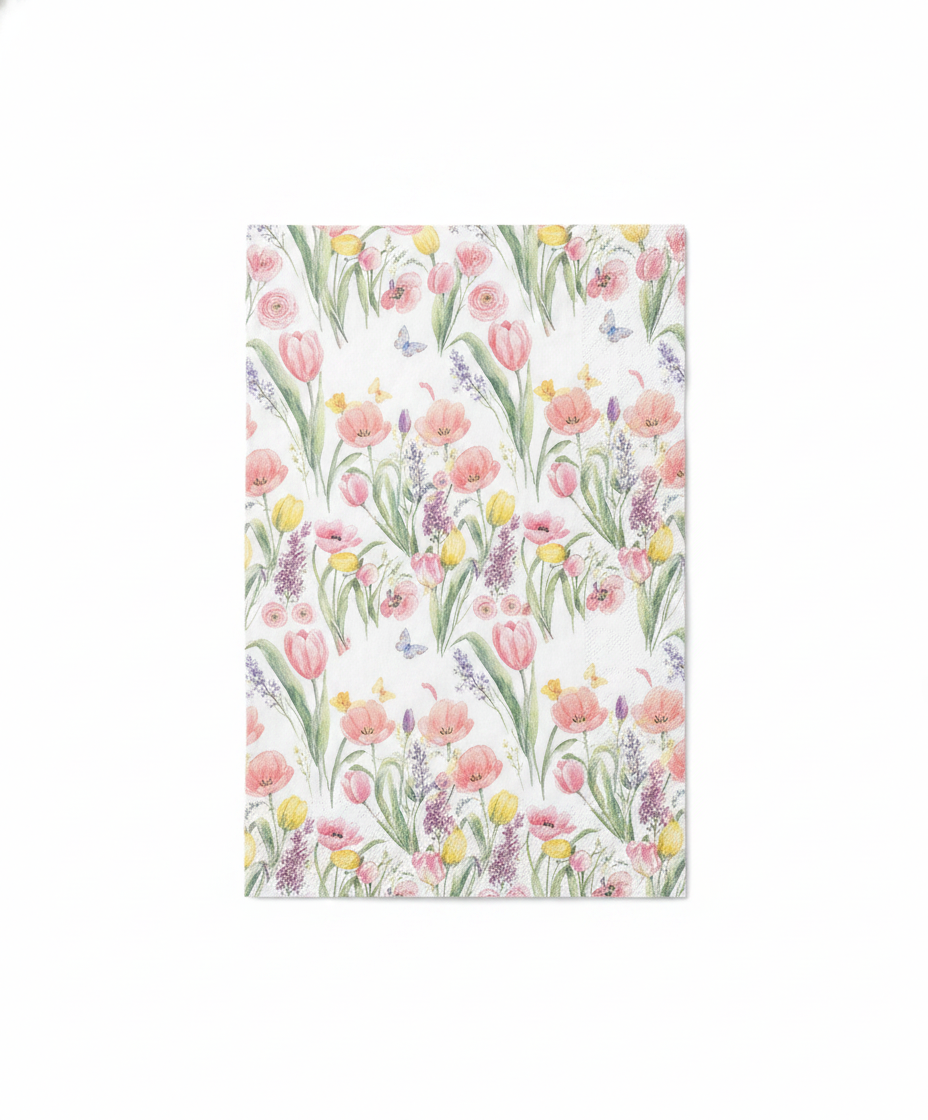 Unfolded rectangular tulip spring paper guest napkin laid flat showing the full spring floral pattern