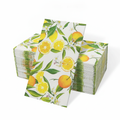 Stack of watercolor lemon print guest paper napkins on white