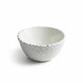 Vetta white stone-textured ceramic deep serving bowl with jagged pointed rim, studio white background