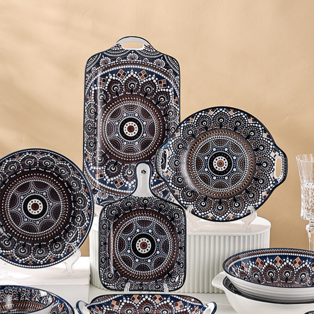 Bohemian floral ceramic tableware set showing bowls and plates with vibrant decal patterns