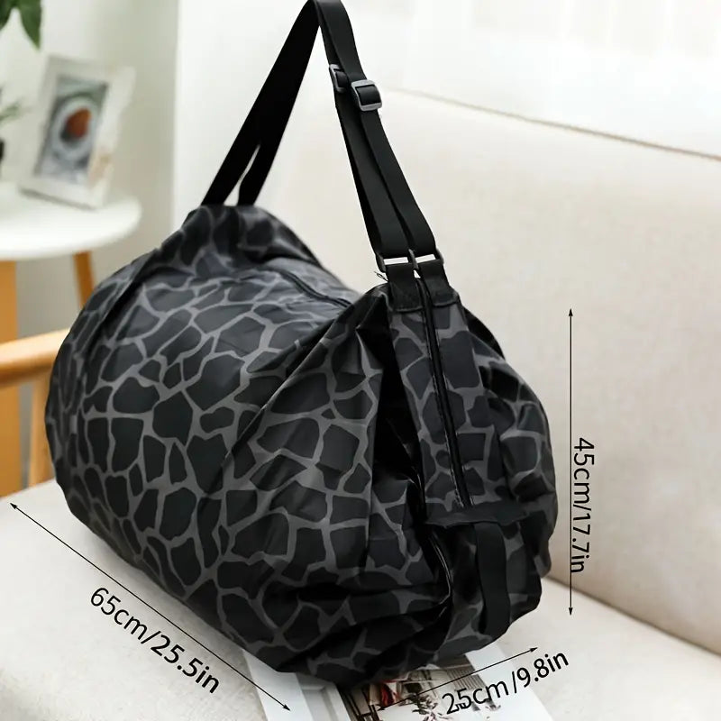 Foldable nylon shopping tote in stone print with dimensions 65 x 45 x 25 cm