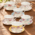 Six floral porcelain teacups with matching saucers in six colors