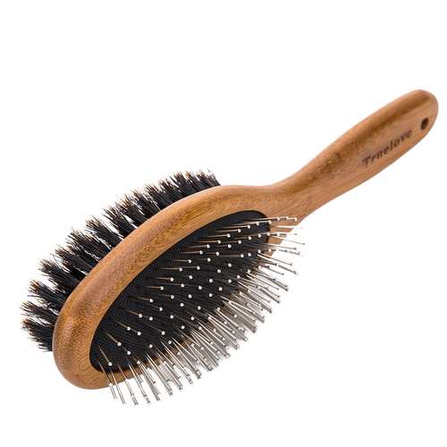 Double-sided bamboo pet grooming brush with boar bristle and steel pin sides on white background