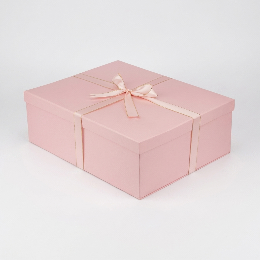 Large pink gift box with gold-edged pink ribbon bow
