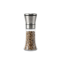 Stainless steel manual pepper grinder with glass body on a pure white background
