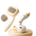 Cat Groom and Shine self-cleaning comb on pure white background, square ecommerce packshot
