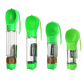 Green portable dog water bottle with food box on pure white background product photo