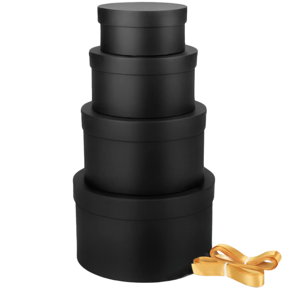 Four round black nesting gift boxes with gold ribbon