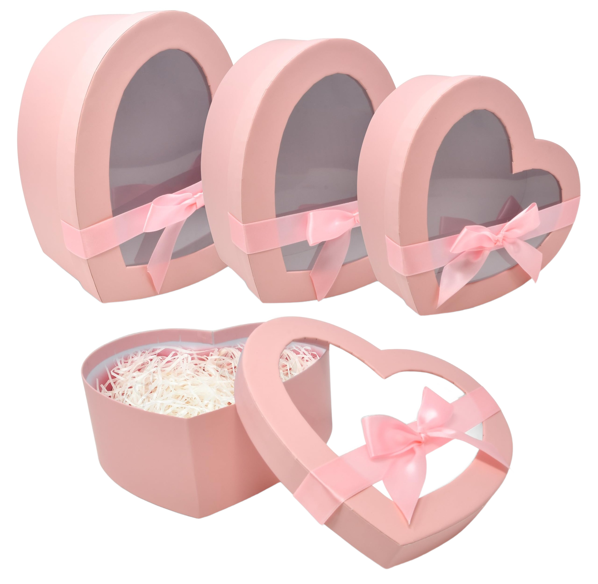 Trio of pink heart-shaped gift boxes with clear windows and pink bows