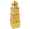Set of 4 gold square nesting gift boxes with gold bows