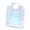 Holographic iridescent gift bag with handles on white background