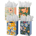 Set of four floral-print gift bags with white tissue paper