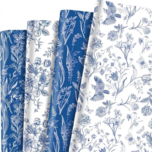 Blue and white botanical toile floral wrapping paper, flat sheets fanned out