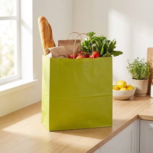 Avocado green grocery bag on a kitchen counter with groceries