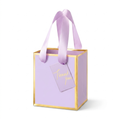 Mini lavender gift bag with gold foil edges and thank you tag