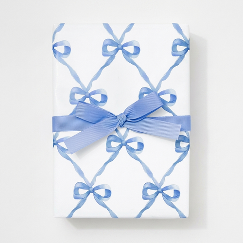 Gift wrapped in blue watercolor bow lattice wrapping paper