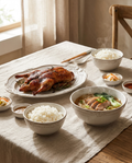 Chic Relief Ceramic Dining Set styled on rustic linen table with rice and roasted vegetables