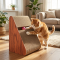 Cat actively scratching and playing with a triangle corrugated cardboard scratcher toy