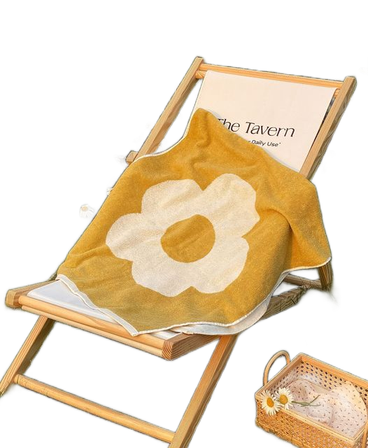 Cotton face towel cutout on white background showing embroidered flower detail