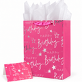 Pink 12.6-inch birthday gift bag with silver HAPPY Birthday print, white tissue and matching greeting card on white.
