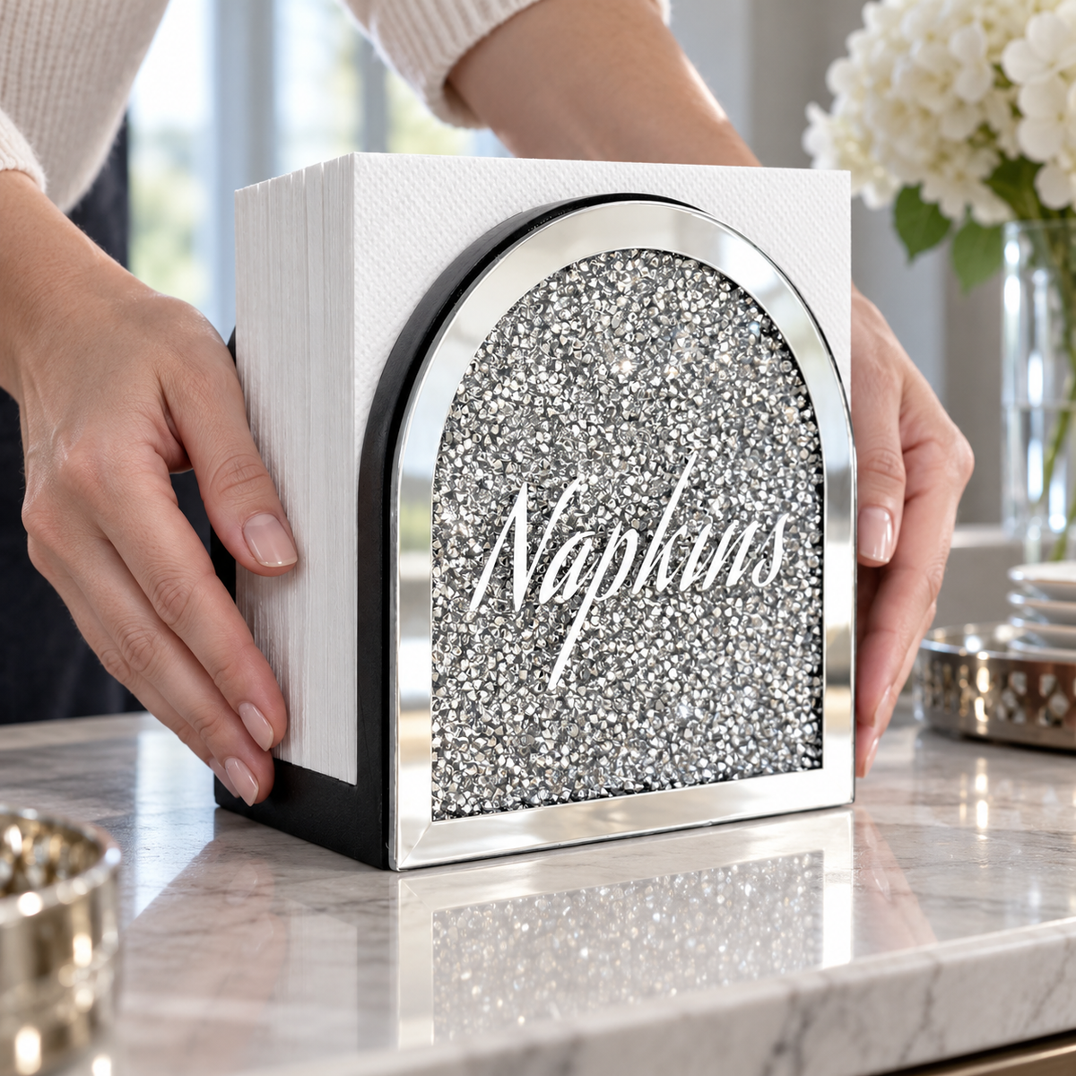 Placing the mirrored napkin holder on a sideboard. Napkins and styling props not included. AI-generated product visualization.