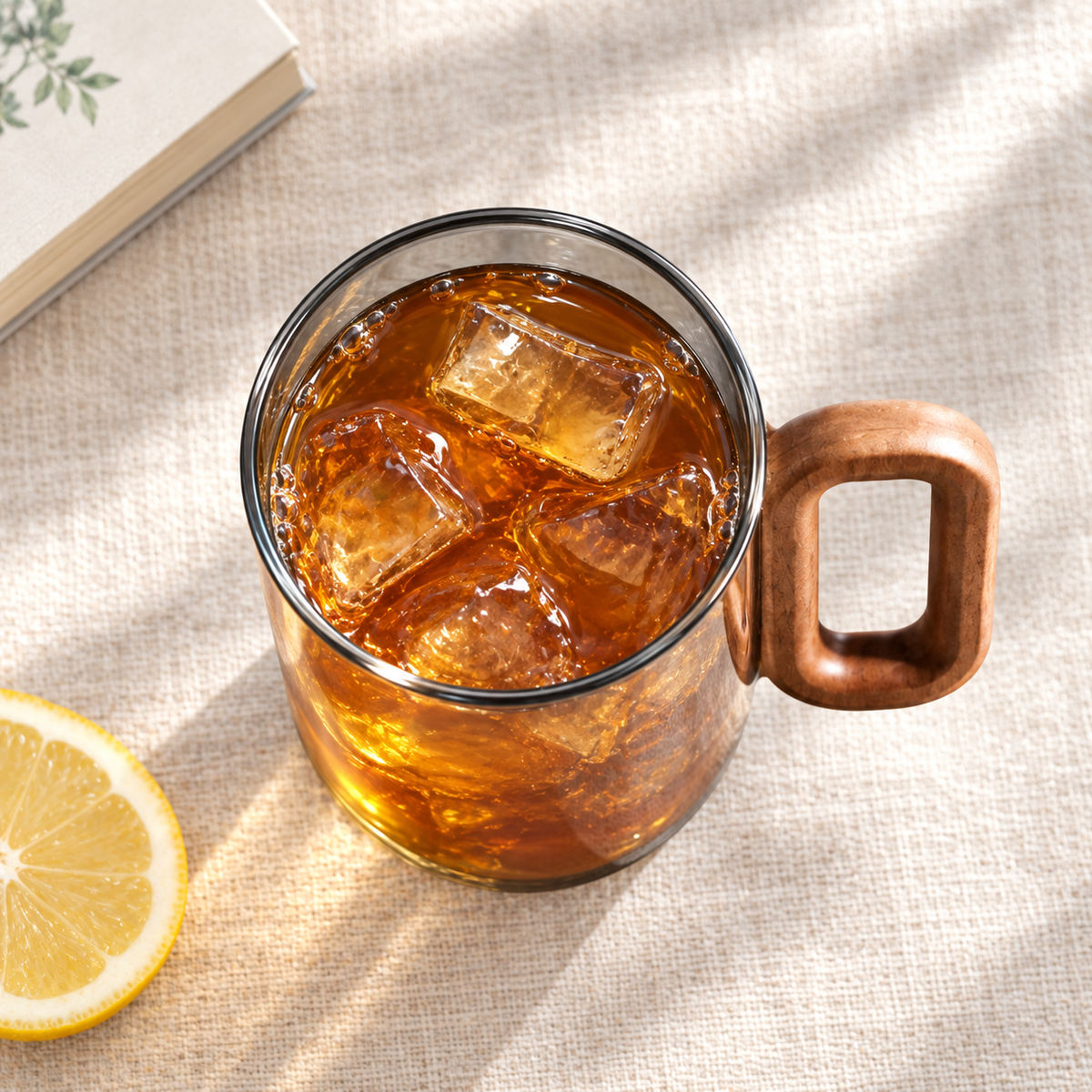 Overhead view of one representative smoke-gray glass from the six-cup set with iced tea; five cups not shown.