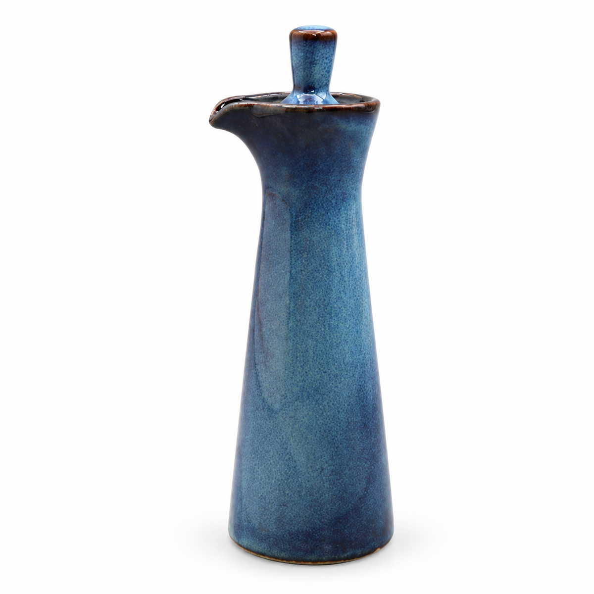 Blue ceramic seasoning bottle on a white background