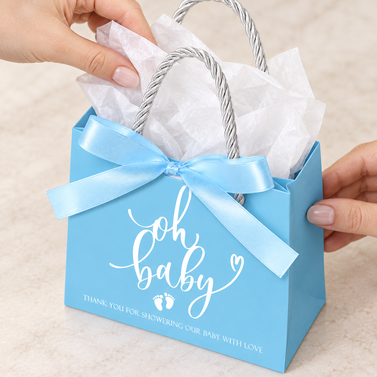 Blue Oh Baby Shower Favour Bags, 25 pc — high-angle tissue packing