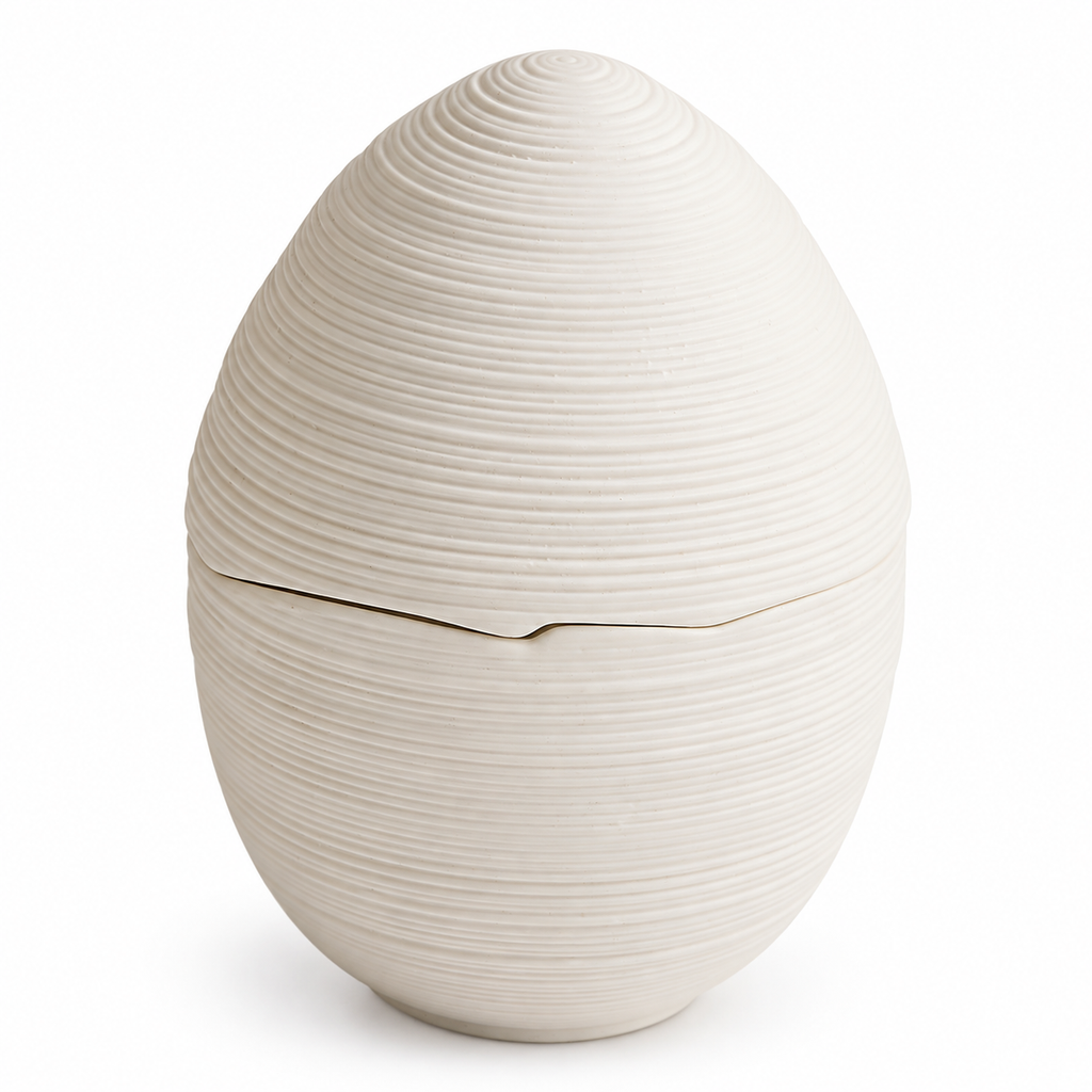 White brushed ceramic egg-shaped lidded bowl on white background
