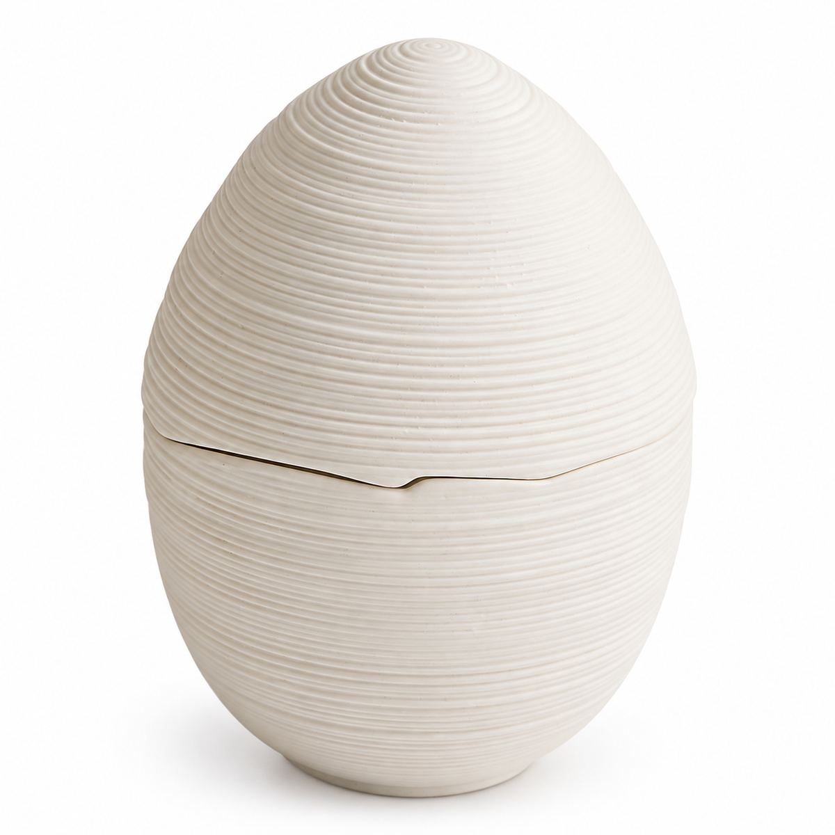White brushed ceramic egg-shaped lidded bowl on white background