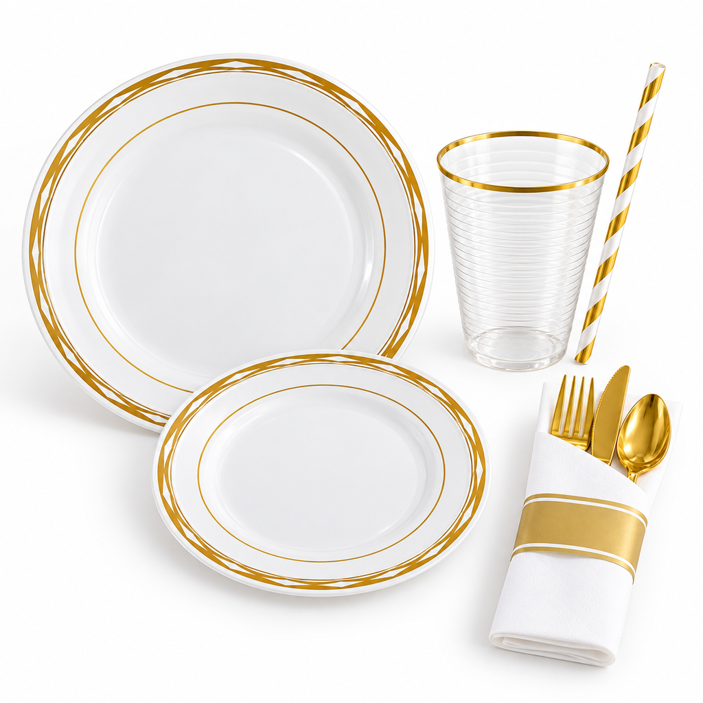 White studio view of white and gold diamond-rimmed plastic plates, gold-rimmed plastic cup, striped straw and gold plastic cutlery wrapped in a paper napkin. Representative components shown.