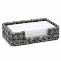 Grey woven guest towel tray with lowered front notch on a white background. Paper towels are styling props and not included.