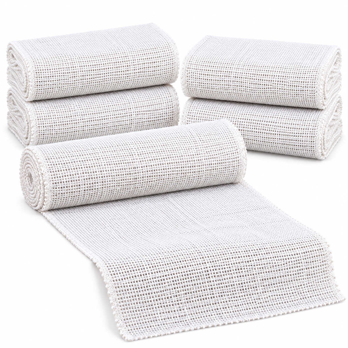Five white jute runners with one partially unfolded on white