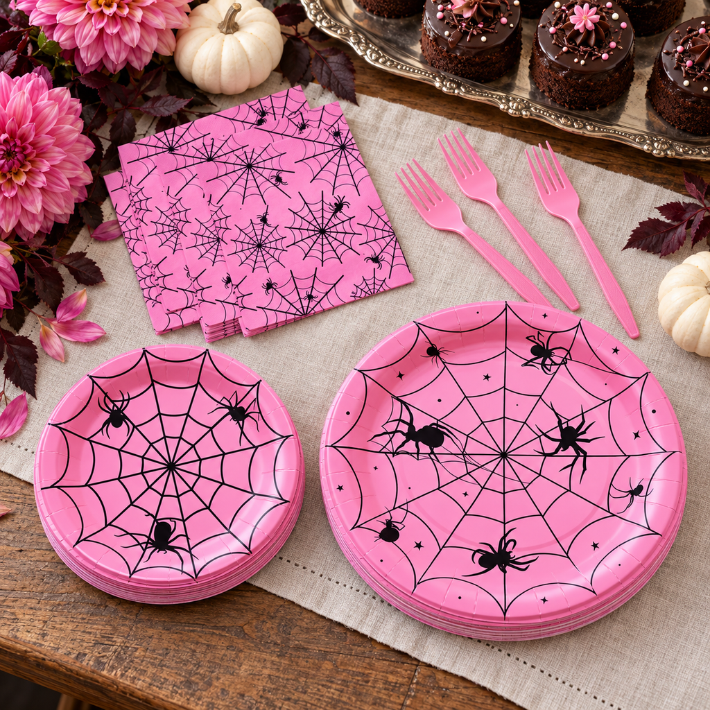 Pink Spider Web Halloween Party Kit for 24 in a styled product photograph. Food, flowers and extra decor are styling props, not included.