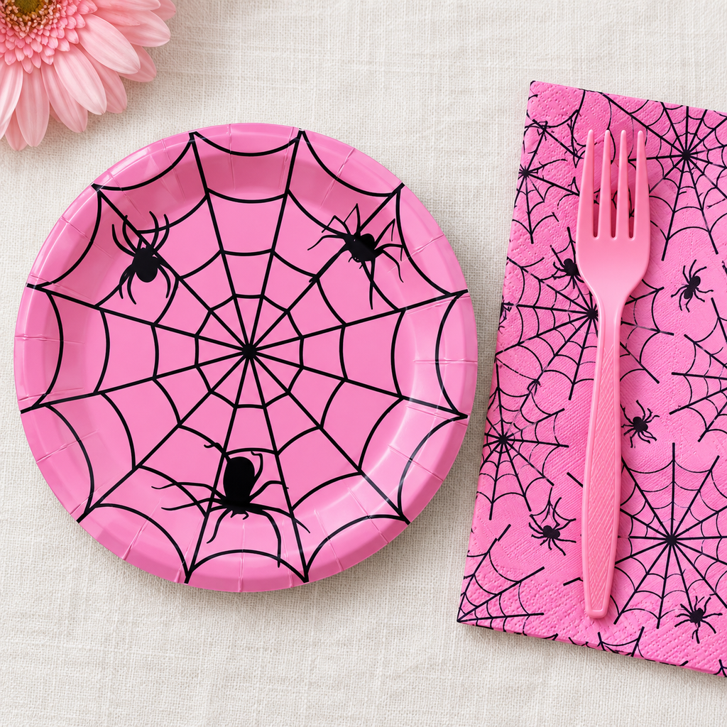 Pink Spider Web Halloween Party Kit for 24 in a styled product photograph. Food, flowers and extra decor are styling props, not included.