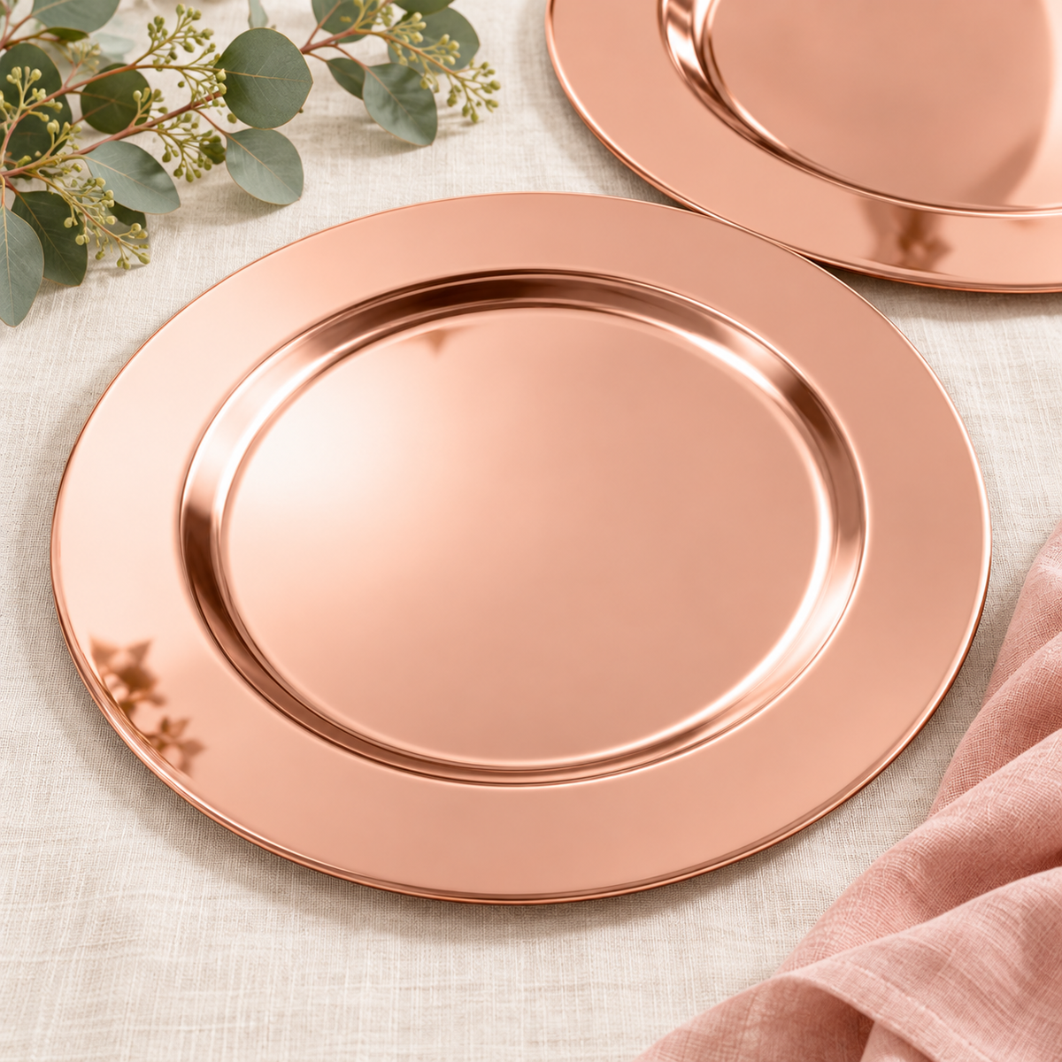 Rose Gold Stainless Steel Charger Plates, 13 in, 12 pc in a styled product photograph. Dinner plates, food, flowers and extra decor are styling props, not included.