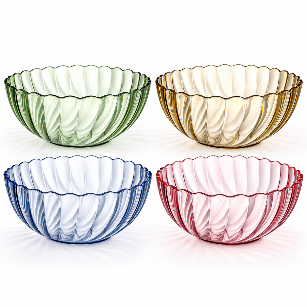 Set of four fluted serving bowls on a white background