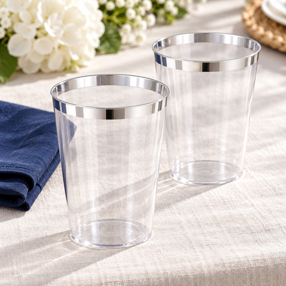 Silver Plastic Party Cups, 12 oz, 200 pc in a styled product photograph. Food, flowers and extra decor are styling props, not included.