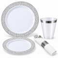 White plates with silver ornamental borders and a clear silver-rimmed cup. Representative component arrangement with rolled cutlery on white, not the full pack quantity.