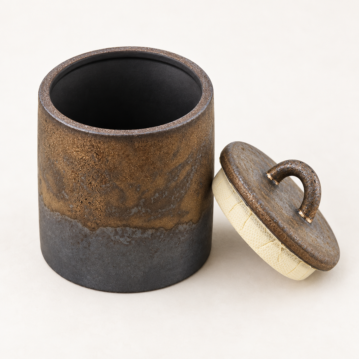 Ceramic tea canister open interior and lid detail
