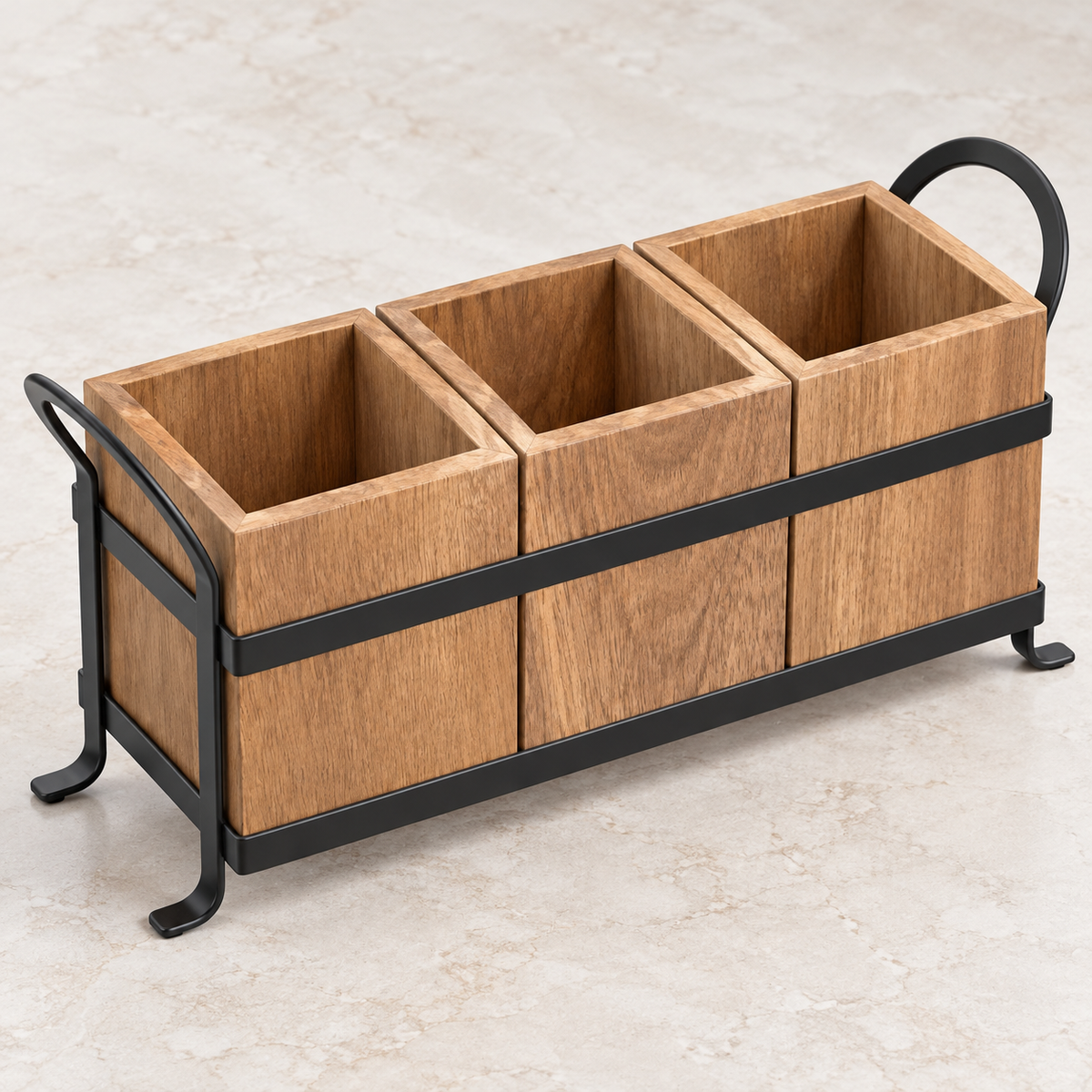 Empty acacia utensil caddy detail showing three wood compartments and black metal frame