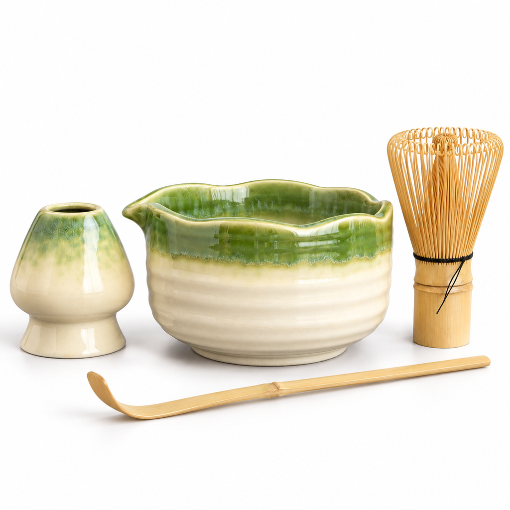 Four-piece green and ivory matcha set with scalloped bowl, holder, bamboo whisk and scoop