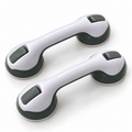 Set of two off-white suction grab handles with gray locking tabs on a clean white background