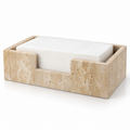 Beige porous stone guest towel holder with white towel styling props on white background