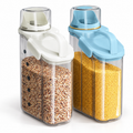 White and pale-blue closed cereal containers on white; two-container set shown. Grain contents are styling props, not included.
